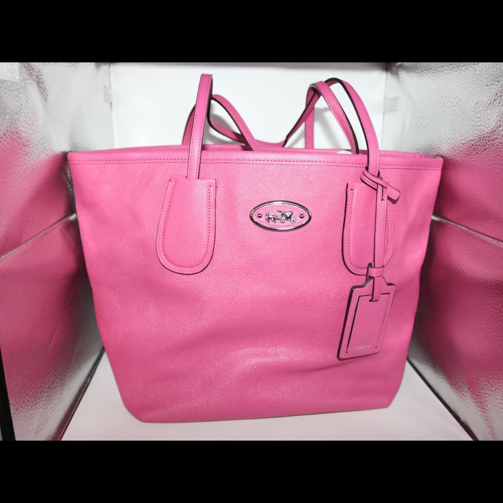 COACH fuchsia crossgrain leather zip top taxi tote
